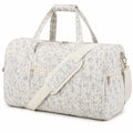 Sac de voyage 45 cm en textile matelassé écru bleu à motif floral avec bandoulière